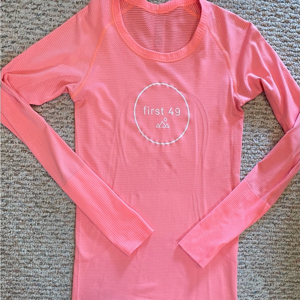 Limited edition First 49 Swiftly. Pink Long Sleeve Athletic Top